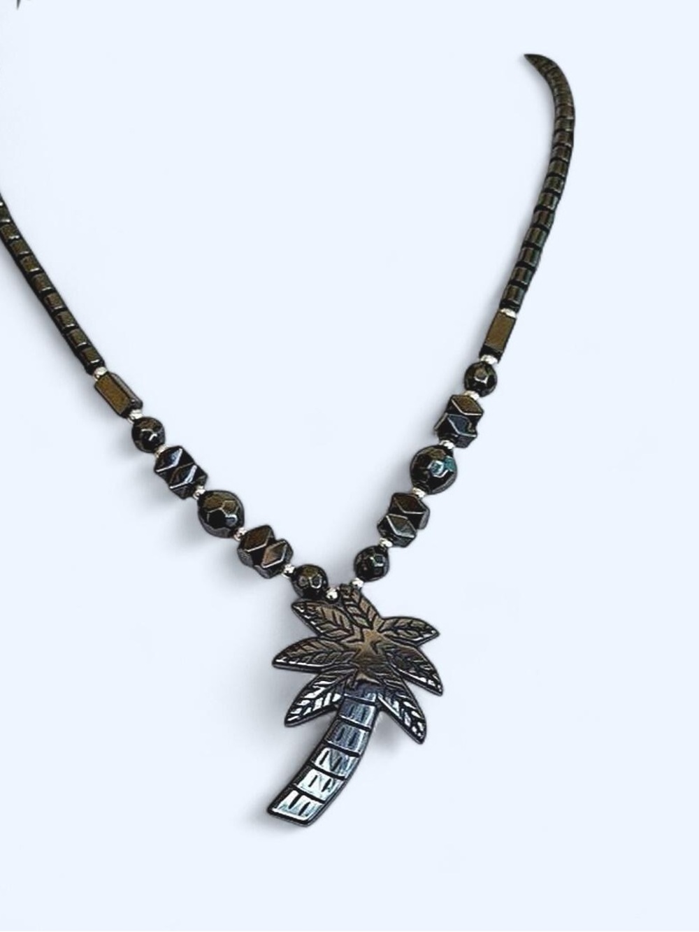 Hematite Necklace with Silver Accents & Carved Palm Tree Pendant 
Vintage 90’s